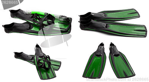 Image of Set of green swim fins, mask and snorkel for diving