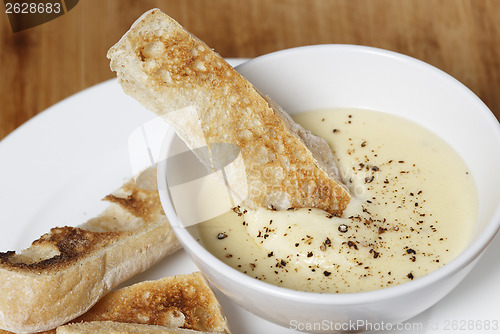 Image of Toast  in cheese dip sauce