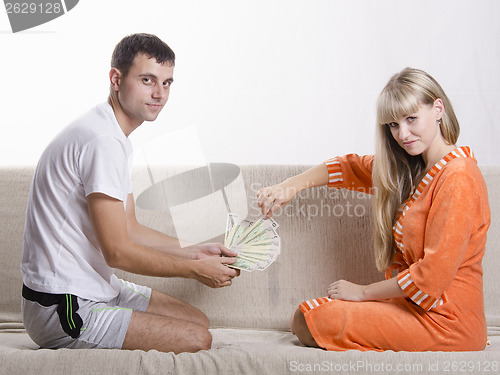 Image of Husband and wife share the salary