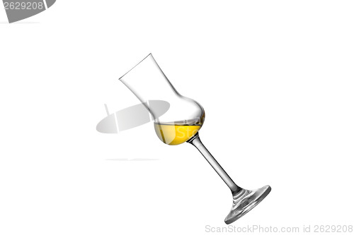 Image of A tilted grappa glass