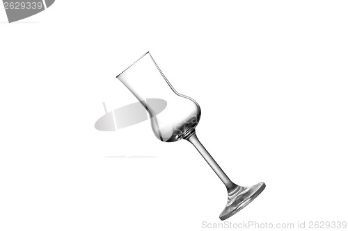 Image of A tilted grappa glass