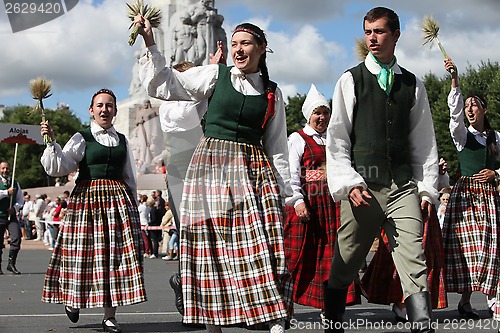 Image of RIGA, LATVIA - JULY 07: People in national costumes at the Latvi