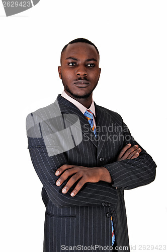 Image of Black man with arms crossed.