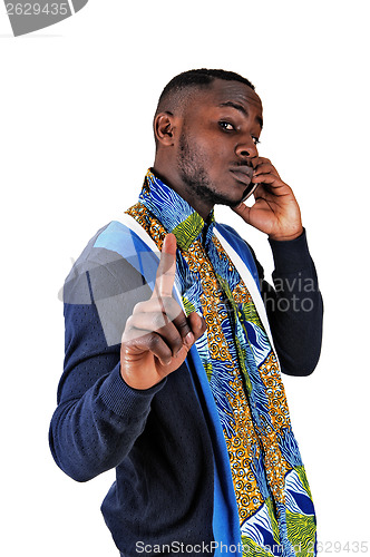 Image of Black man on cell phone.