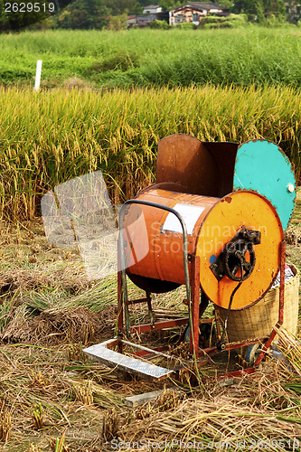 Image of Vintage rice wood machine 