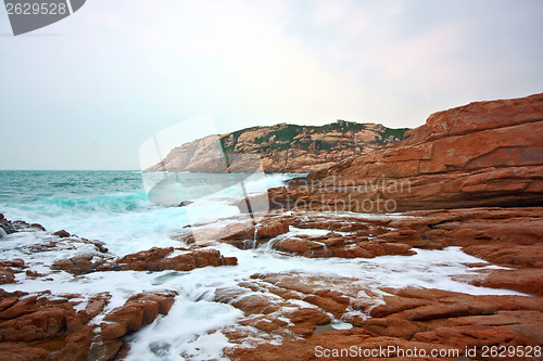 Image of rocky sea coast and blurred water in shek o,hong kong 