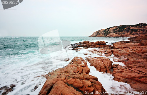 Image of rocky sea coast and blurred water in shek o,hong kong 