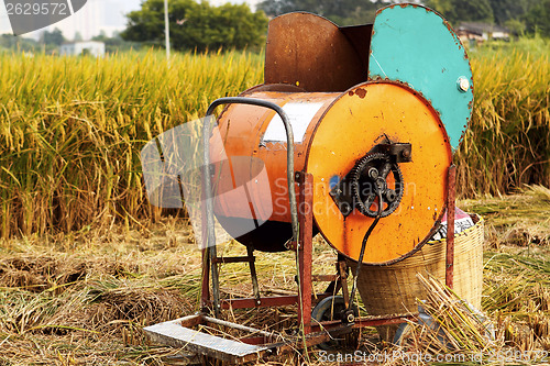 Image of Vintage rice wood machine 