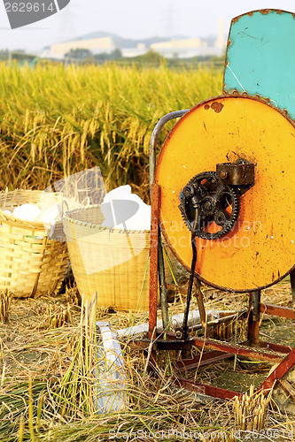 Image of Vintage rice wood machine 
