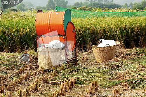 Image of Vintage rice wood machine 