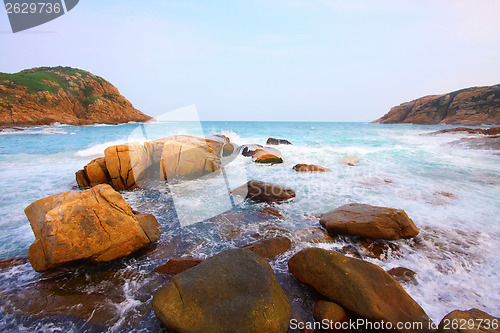 Image of rocky sea coast and blurred water in shek o,hong kong 