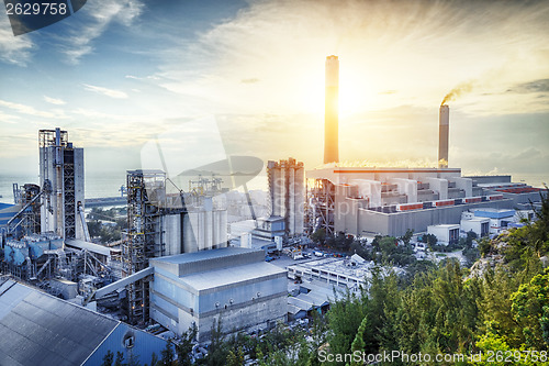 Image of Glow light of petrochemical industry on sunset.