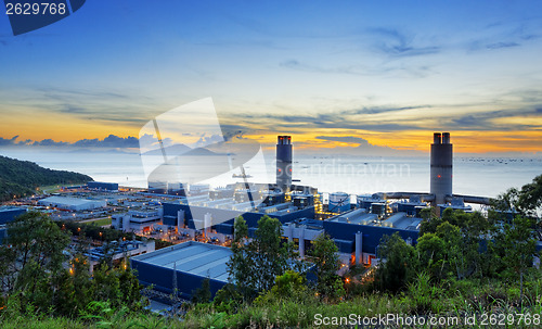 Image of power station at sunset