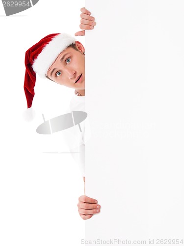 Image of Young man in Santa hat