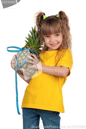 Image of Little girl with pineapple