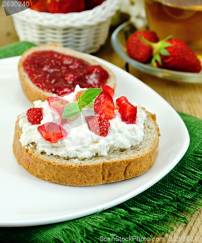 Image of Bread with curd cream and strawberry jam