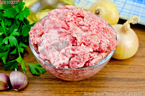 Image of Minced meat on the board with a napkin