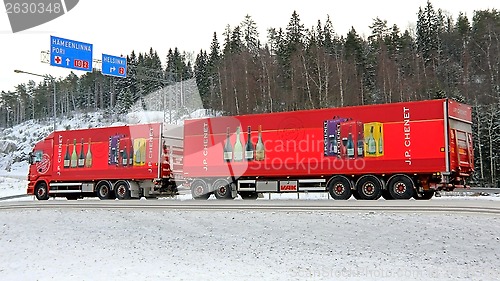 Image of Red Scania Truck with Wine Trailers on the Road