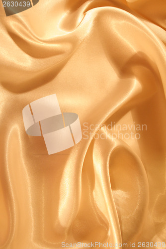 Image of Smooth elegant golden silk as background 