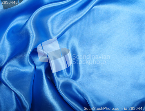 Image of Smooth elegant blue silk as background 