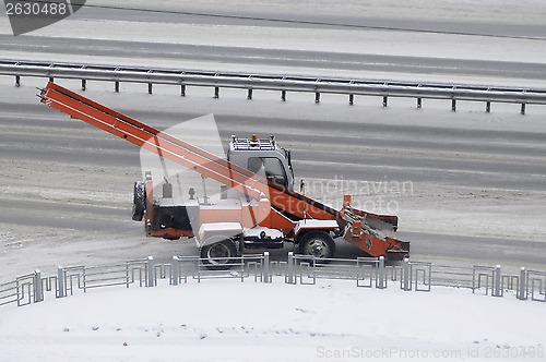 Image of the snowplow on the road.