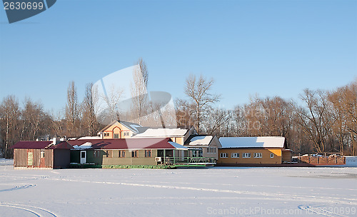 Image of Floating hotel on a winter lake.