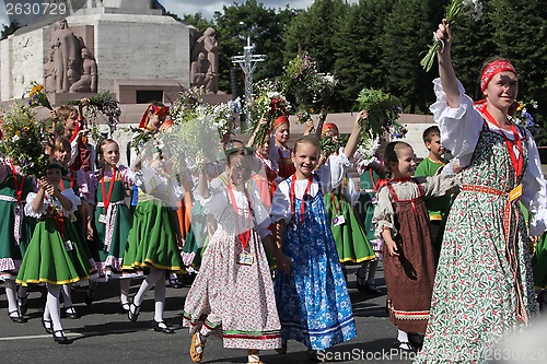 Image of RIGA, LATVIA - JULY 07: People in national costumes at the Latvi