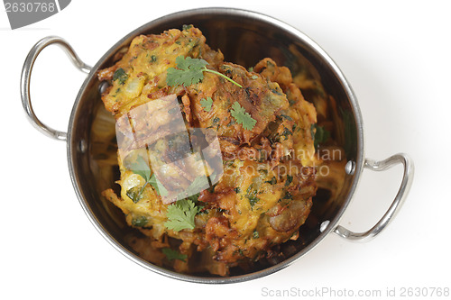 Image of Onion bhajis in a kadai top view