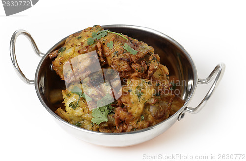 Image of Onion bhajis served in a kadai