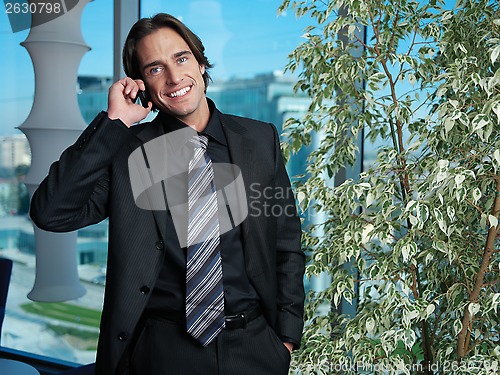 Image of man with mobile nn