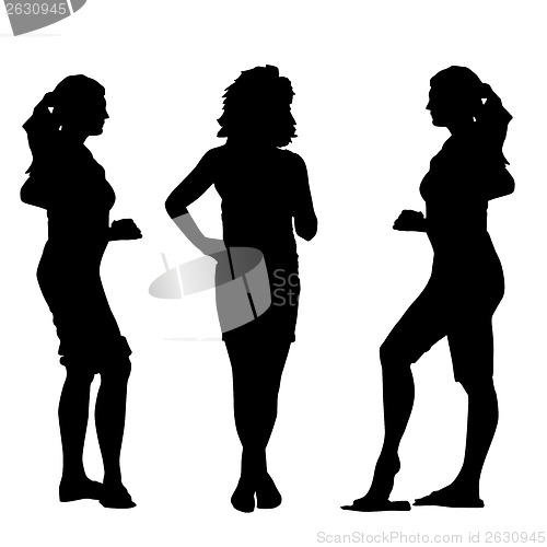 Image of Black silhouettes of beautiful womans on white background. Vecto