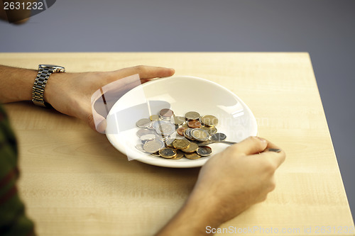 Image of Eating some coins