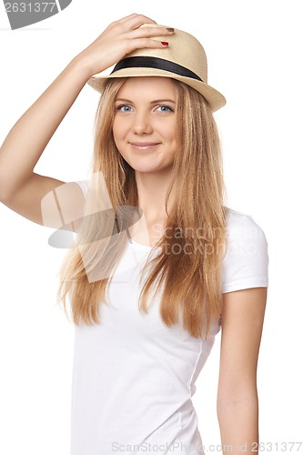 Image of Stylish casual young woman holding her hat cock