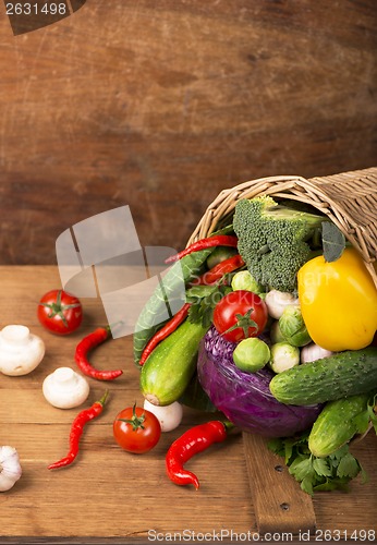 Image of Healthy Organic Vegetables on a Wooden Background