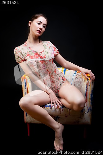 Image of Pretty girl on chair
