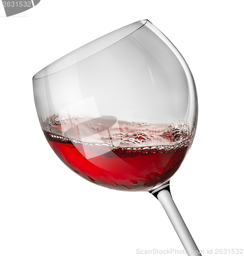 Image of Moving red wine glass