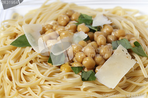 Image of Bavette pasta and chickpeas meal closeup