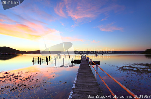 Image of Colourful sunset and water reflections at Yattalunga Australia