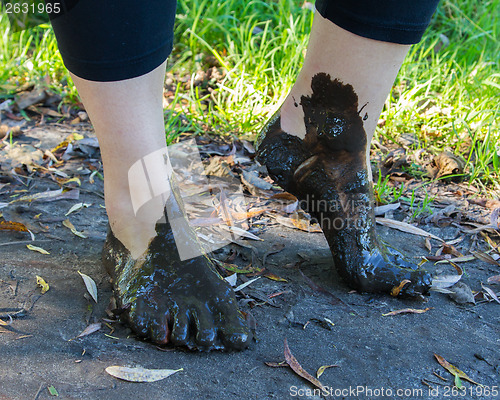 Image of Feet in mud close-up