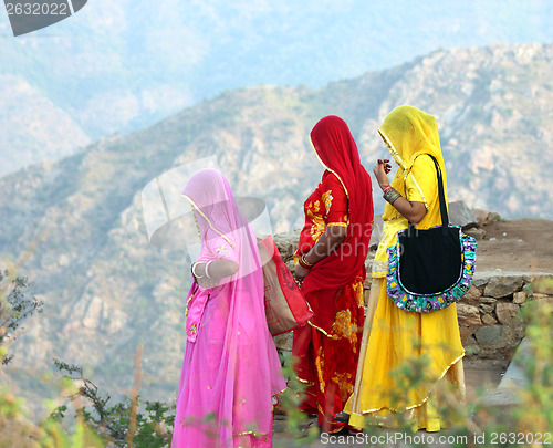 Image of Indian women in colorful saris on top of hill