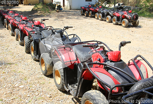 Image of quad bikes atv in row