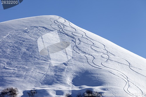 Image of Off piste slope with trace of skis on snow