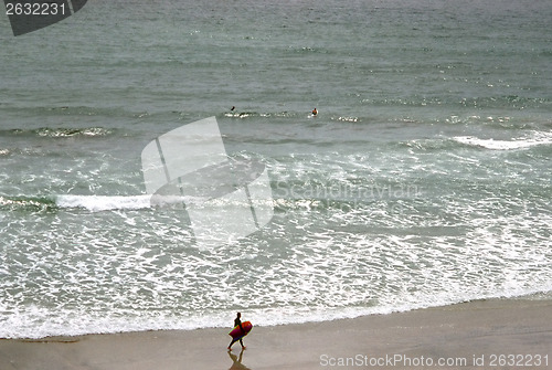 Image of Surfer on beach