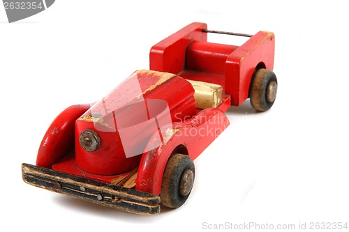 Image of old red wooden car toy