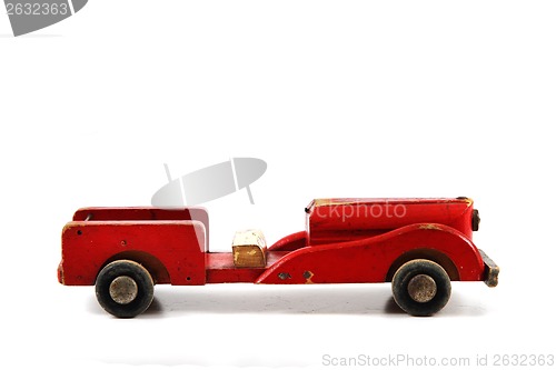 Image of old red wooden car toy