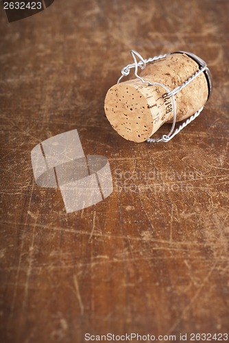 Image of bottle corks on the wooden background