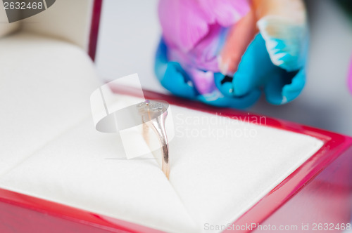 Image of Unusual multi colored tulips and ring