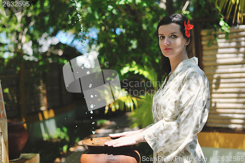 Image of spa treatment at tropical resort