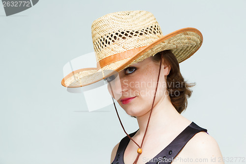 Image of girl in a straw hat