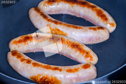 Image of German sausage Bratwurst in a pan